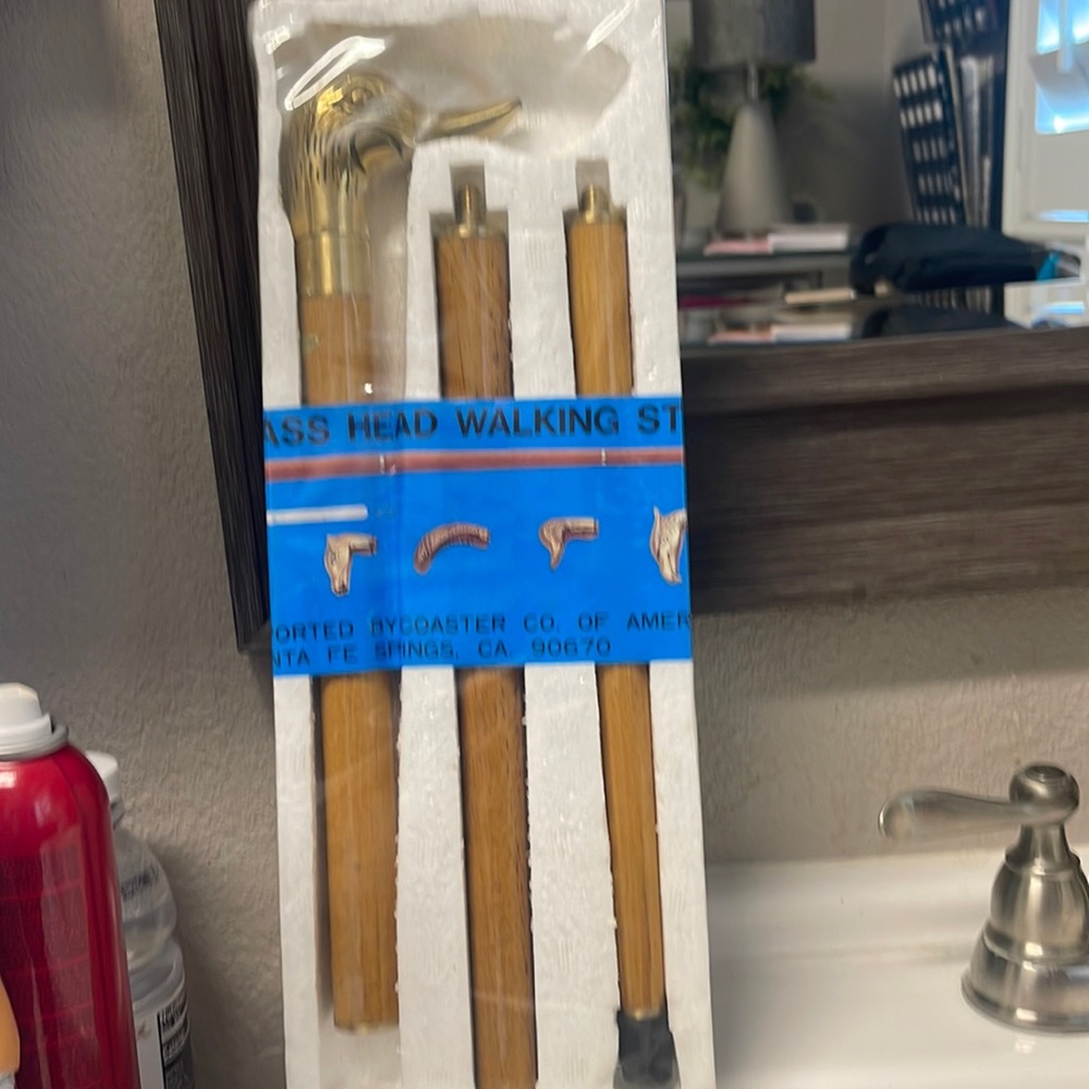 - Brass head walking stick new in package